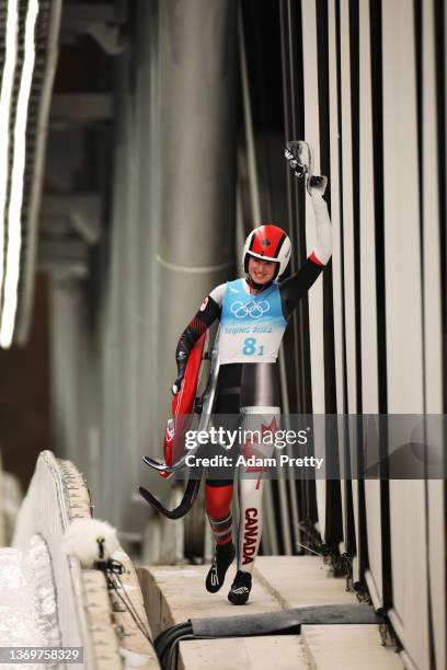 Trinity Ellis of Team Canada reacts after sliding during the Luge Team Relay on day six of the Beijing 2022 Winter Olympics at National Sliding...