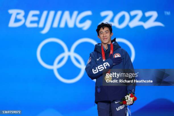 Gold medallist, Nathan Chen of Team United States celebrates during the Figure Skating Men Single Skating medal ceremony on Day 6 of the Beijing 2022...