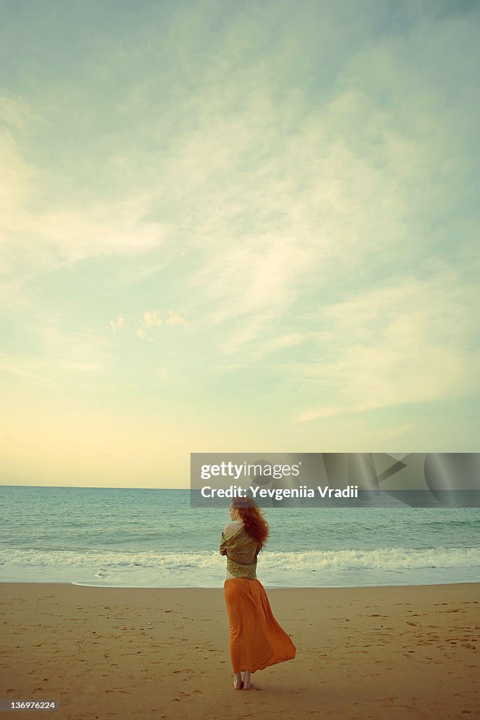 Woman standing on beach