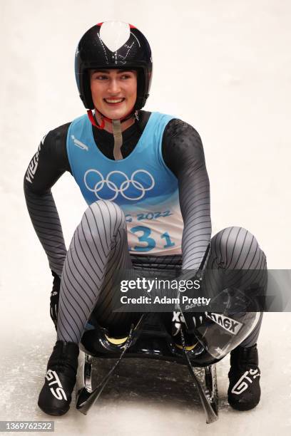 Madeleine Egle of Team Austria reacts after sliding during the Luge Team Relay on day six of the Beijing 2022 Winter Olympics at National Sliding...