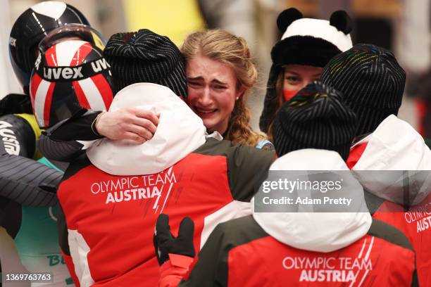 Team Austria celebrate after winning silver during the Luge Team Relay on day six of the Beijing 2022 Winter Olympics at National Sliding Centre on...