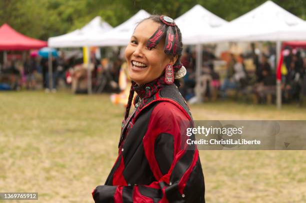 pow wow at oppenheimer park, dancer smiling at the camera - powwow stock pictures, royalty-free photos & images