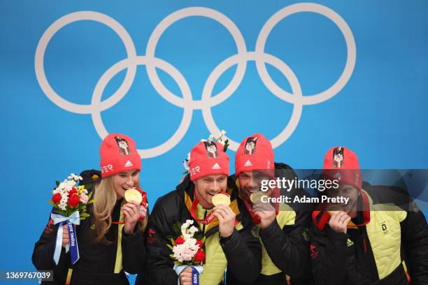 Natalie Geisenberger , Johannes Ludwig , Tobias Wendl and Tobias Arlt of Team Germany react after winning the gold medal for the Luge Team Relay on...