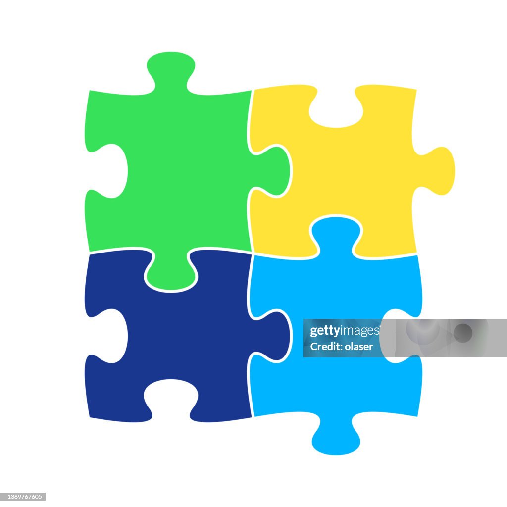 Four jigsaw puzzle pieces representing teamwork