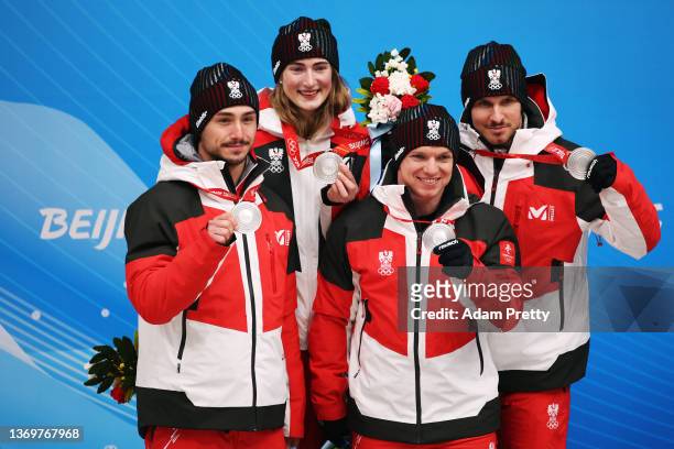 Madeleine Egle , Wolfgang Kindl , Thomas Steu and Lorenz Koller of Team Austria react after winning the silver medal for Luge Team Relay on day six...
