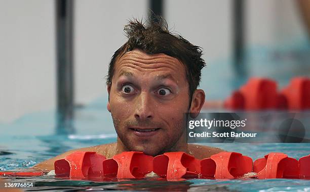 Ian Thorpe of New South Wales checks his time on the scoreboard after swimming in the Mens 200 Meter Freestyle Final during day two of the 2012...