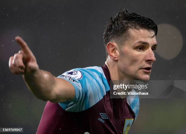 Ashley Westwood of Burnley during the Premier League match between Burnley and Manchester United at Turf Moor on February 8, 2022 in Burnley, United...