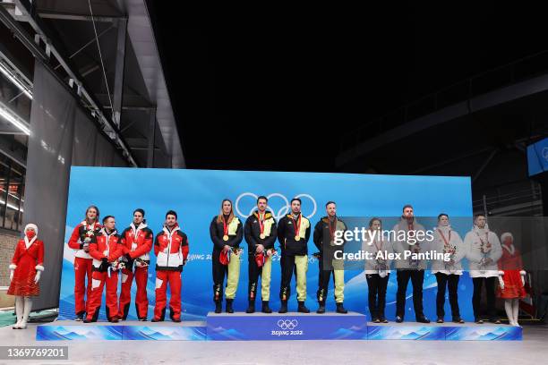 Gold medallists Natalie Geisenberger, Johannes Ludwig, Tobias Wendl and Tobias Arlt of Team Germany , silver medallists Madeleine Egle, Wolfgang...