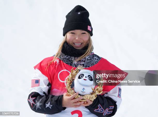 Gold medallist Chloe Kim of Team United States celebrates during the Women's Snowboard Halfpipe Final flower ceremony on Day 6 of the Beijing 2022...