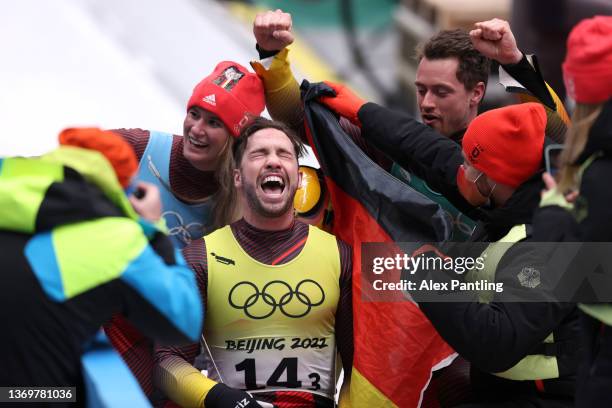 Tobias Wendl and Tobias Arlt of Team Germany celebrate as they claim gold during the Luge Team Relay on day six of the Beijing 2022 Winter Olympics...