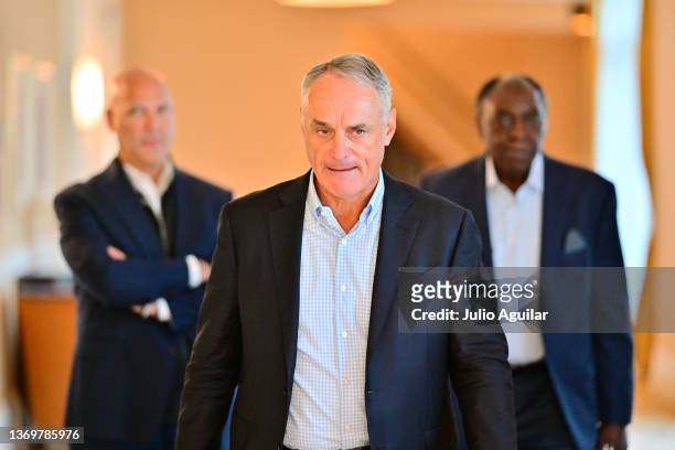 Major League Baseball Commissioner Rob Manfred walks to a press conference during an MLB owner's meeting at the Waldorf Astoria on February 10, 2022...