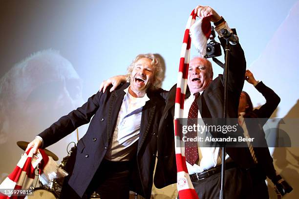 Uli Hoeness celebrates with Thomas Gottschalk at the Uli Hoeness' 60th birthday celebration at Postpalast on January 13, 2012 in Munich, Germany.