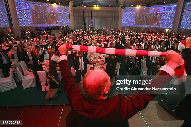 Uli Hoeness sings at the Uli Hoeness' 60th birthday celebration at Postpalast on January 13, 2012 in Munich, Germany.