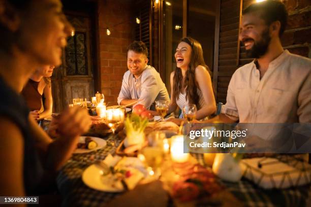 group of friends enjoy the wine and amazing food during garden party - cheese platter stock pictures, royalty-free photos & images