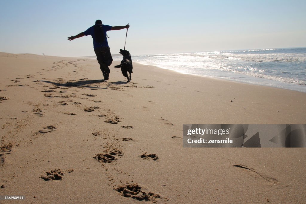 Person running with dog