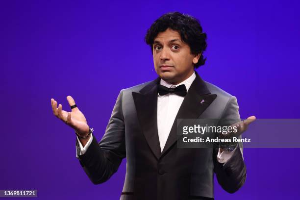 Jury President M. Night Shyamalan is seen on stage at the Opening Ceremony and "Peter von Kant" premiere during the 72nd Berlinale International Film...