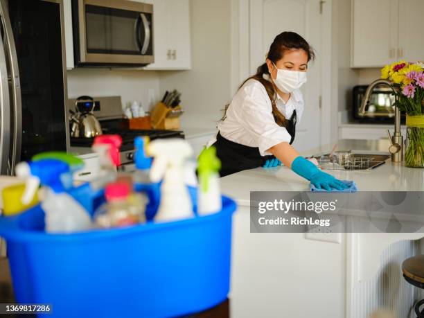 professional housecleaner at work - janitorial services stockfoto's en -beelden