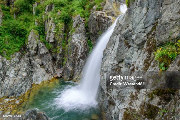 scenic view of waterfall on mountain at mercantour national park, france - mercantour stockfoto's en -beelden