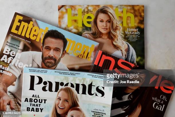 In this photo illustration, InStyle, Entertainment Weekly, Parents, and a Health magazine are displayed together on February 10, 2022 in Miami,...