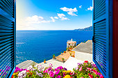 Scenic open window view of the Mediterranean Sea from a luxury resort room along the Amalfi Coast near Sorrento, Italy