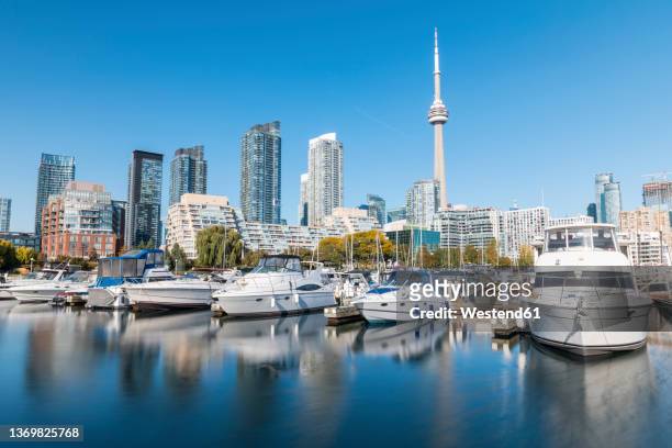 canada, ontario, toronto, yachts moored in city marina - day toronto stock pictures, royalty-free photos & images