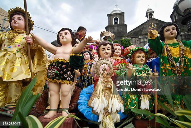 Catholic devotees celebrate the feast of Santo Nino with various religious images of the Child Jesus in a grand procession dubbed "Lakbayaw" from the...