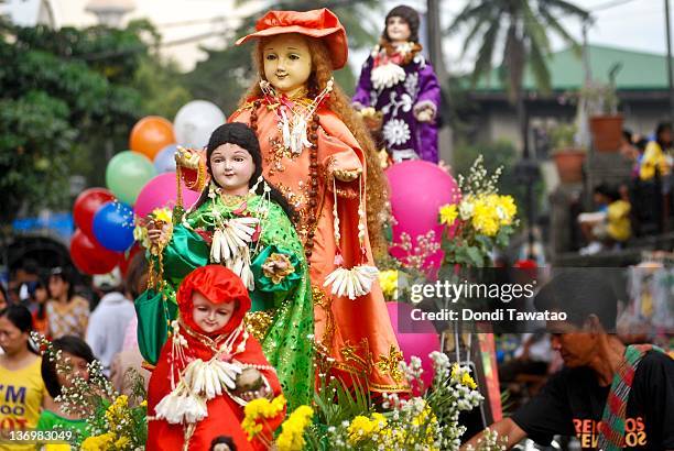 Catholic devotees celebrate the feast of Santo Nino with various religious images of the Child Jesus in a grand procession dubbed "Lakbayaw" from the...