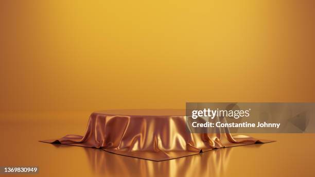 luxury table or podium display stand covered with red silk - piédestal photos et images de collection