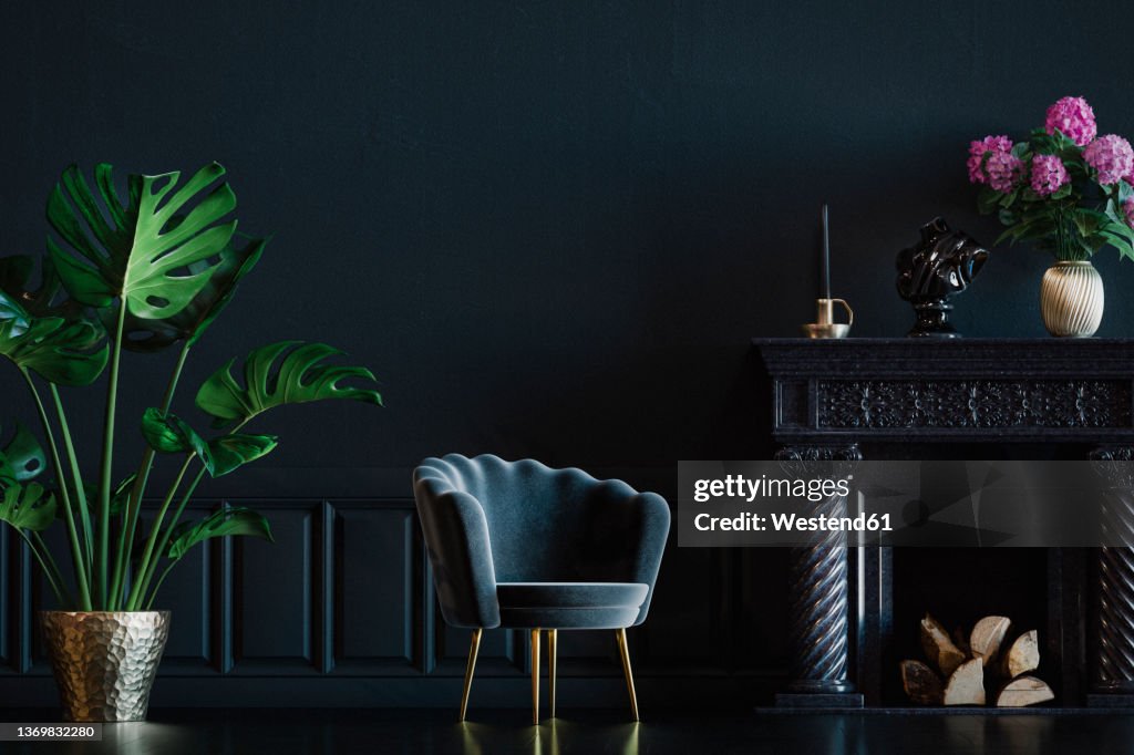 Three dimensional render of dark living room with single chair, potted plant, wall panels and fireplace