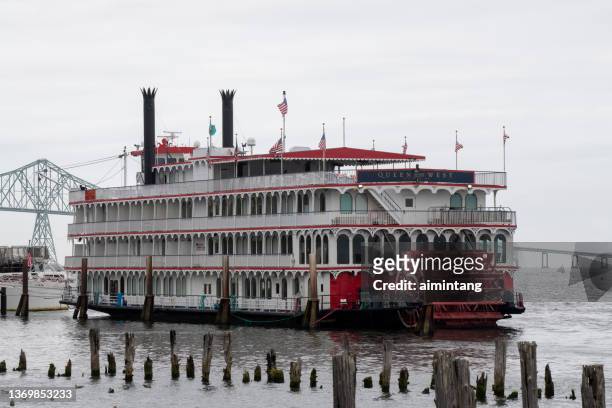 queen in the west cruise ship at columbia river maritime museum - astoria stock pictures, royalty-free photos & images