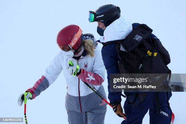 Mikaela Shiffrin of Team United States with her coach inspect the course prior to the Women's Super-G on day seven of the Beijing 2022 Winter Olympic...