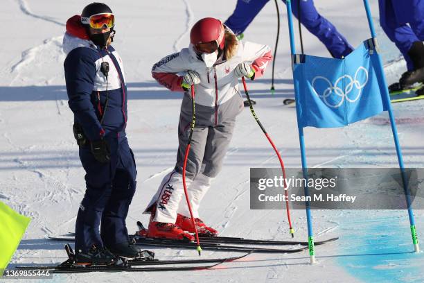 Mikaela Shiffrin of Team United States with her coach inspect the course prior to the Women's Super-G on day seven of the Beijing 2022 Winter Olympic...