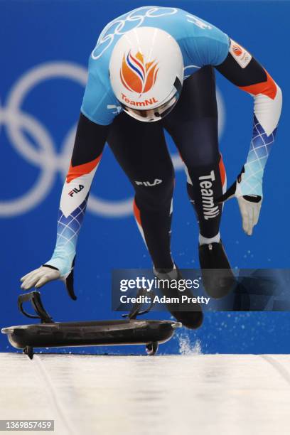 Kimberley Bos of Team Netherlands slides during the Women's Skeleton heats on day seven of Beijing 2022 Winter Olympic Games at National Sliding...