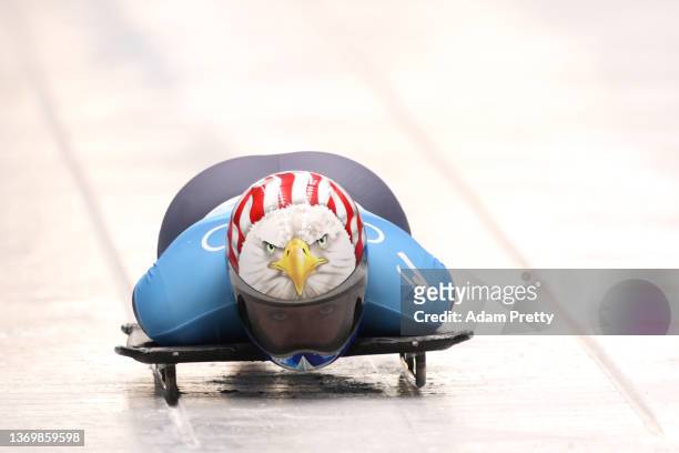 Katie Uhlaender of Team United States slides during the Women's Skeleton heats on day seven of Beijing 2022 Winter Olympic Games at National Sliding...