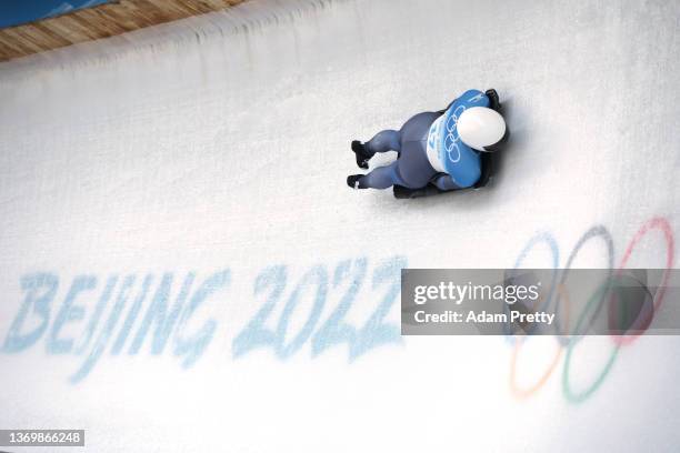Kelly Curtis of Team United States slides during the Women's Skeleton heats on day seven of Beijing 2022 Winter Olympic Games at National Sliding...