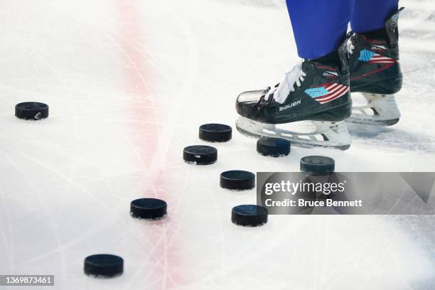 General view of hockey pucks during the Women's Ice Hockey Quarterfinal game between Team United States and Team Czech Republic on Day 7 of the...