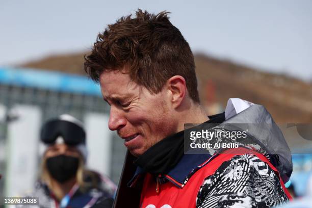 Shaun White of Team United States shows emotion after finishing fourth during the Men's Snowboard Halfpipe Final on day 7 of the Beijing 2022 Winter...
