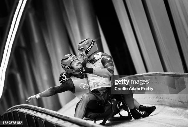 Tobias Wendl and Tobias Arlt of Team Germany react after winning the gold medal in the Luge Doubles on day five of the Beijing 2022 Winter Olympic...