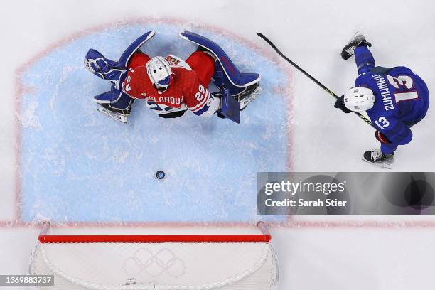 Goaltender Klara Peslarova of Team Czech Republic can't make the save on a shot for a goal by Lee Stecklein of Team United States as Grace Zumwinkle...