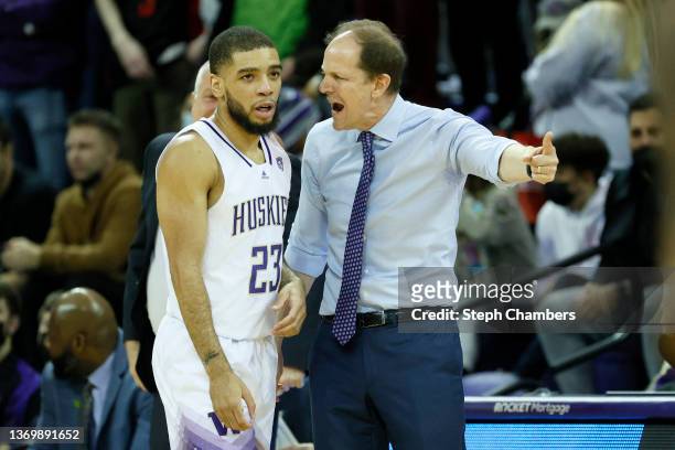 Terrell Brown Jr. #23 and head coach Mike Hopkins of the Washington Huskies talk during the first half against the Arizona State Sun Devils at Alaska...