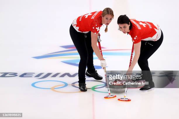 Melanie Barbezat and Esther Neuenschwander of Team Switzerland compete against Team ROC during the Women's Round Robin Curling Session on Day 7 of...