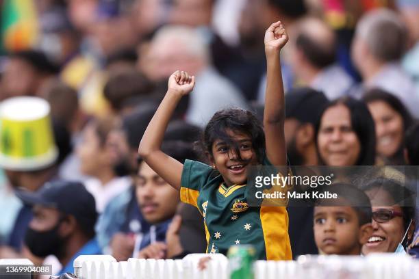 Young girl in the crowd cheers during game one in the T20 International series between Australia and Sri Lanka at Sydney Cricket Ground on February...