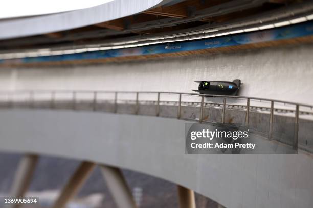 Shanwayne Stephens of Team Jamaica slides during the 2-man Bobsleigh training on day seven of Beijing 2022 Winter Olympic Games at National Sliding...