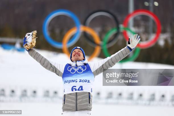 Gold medallist Iivo Niskanen of Team Finland celebrates during the Men's Cross-Country Skiing 15km Classic flower ceremony on Day 7 of Beijing 2022...