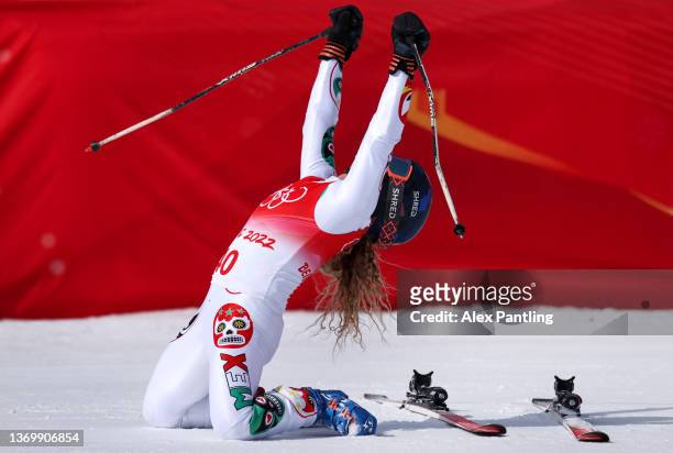 Sarah Schelper of Team Mexico celebrates as they cross the finish line during the Women's Super-G on day seven of the Beijing 2022 Winter Olympic...