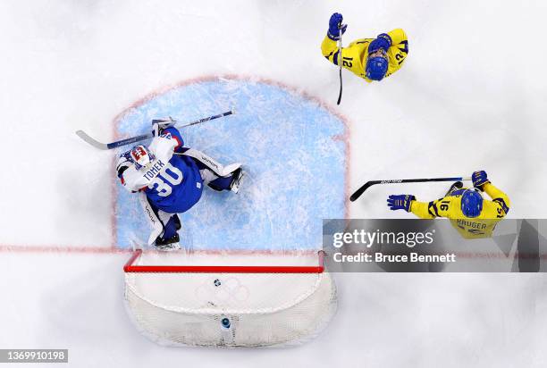 Max Friberg of Team Sweden scores the third goal in the first period during the Men's Ice Hockey Preliminary Round Group C match on Day 7 of the...