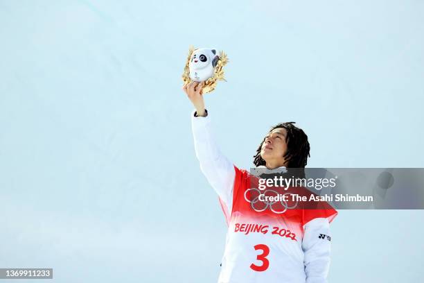 Gold medalist Ayumu Hirano of Team Japan celebrates during the flower ceremony for the Snowboard Men's Halfpipe on day seven of the Beijing 2022...