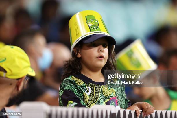 Young supporter in the crowd watches on during game one in the T20 International series between Australia and Sri Lanka at Sydney Cricket Ground on...