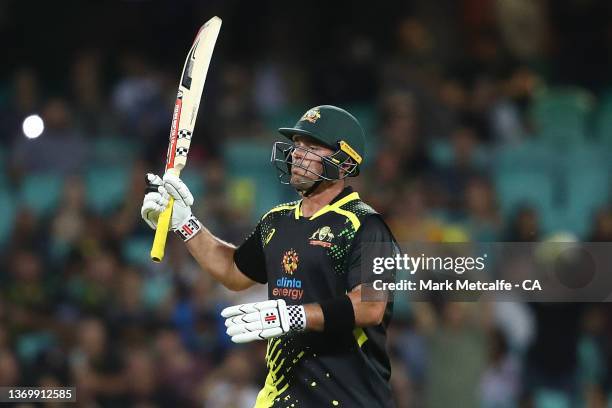 Ben McDermott of Australia celebrates and acknowledges the crowd after hitting a half century during game one in the T20 International series between...