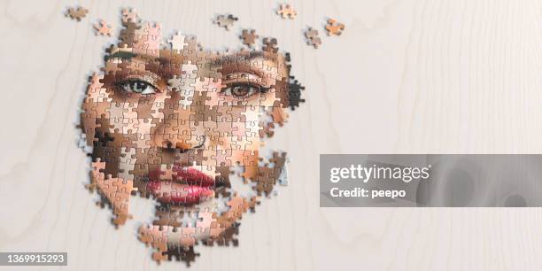 jigsaw puzzle of multi-ethnic female face - quebra cabeça imagens e fotografias de stock